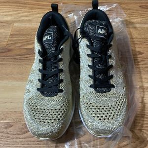 APL size 8 womens sneakers. Beautiful gold and silver w/ black laces. Never worn